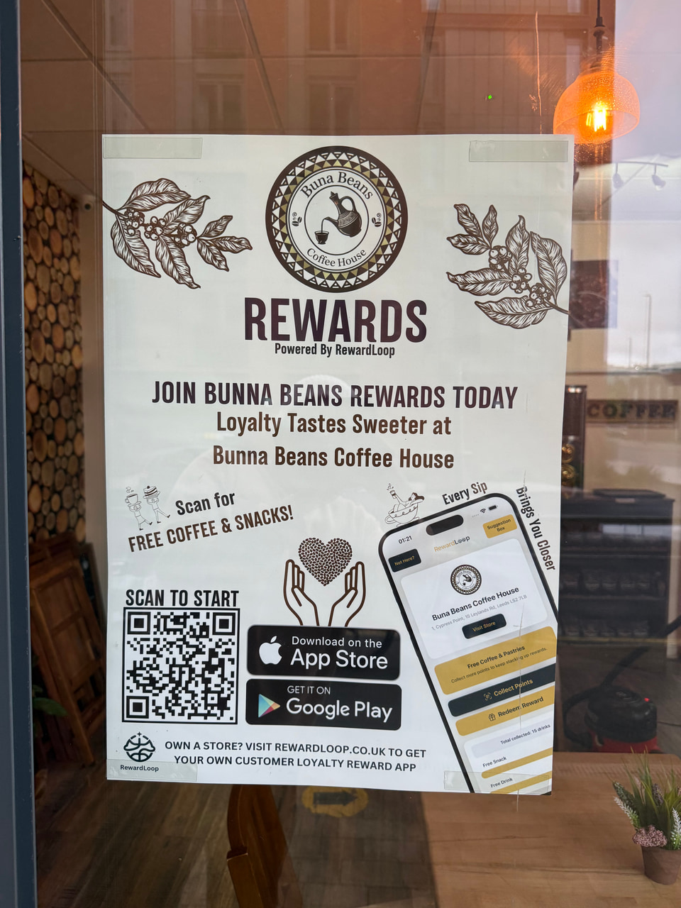 RewardLoop loyalty poster displayed in a store window