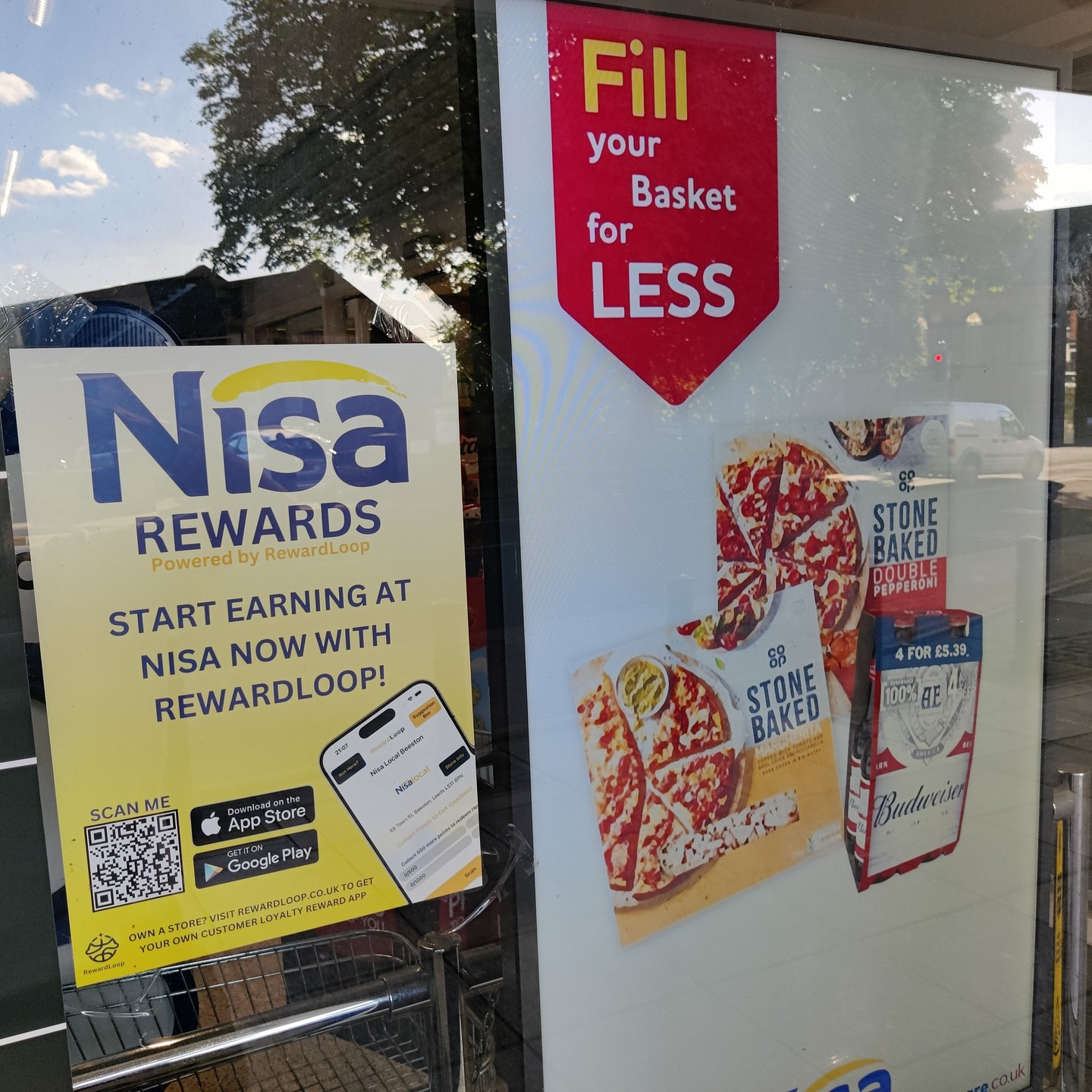 RewardLoop poster displayed in a Nisa Local store window