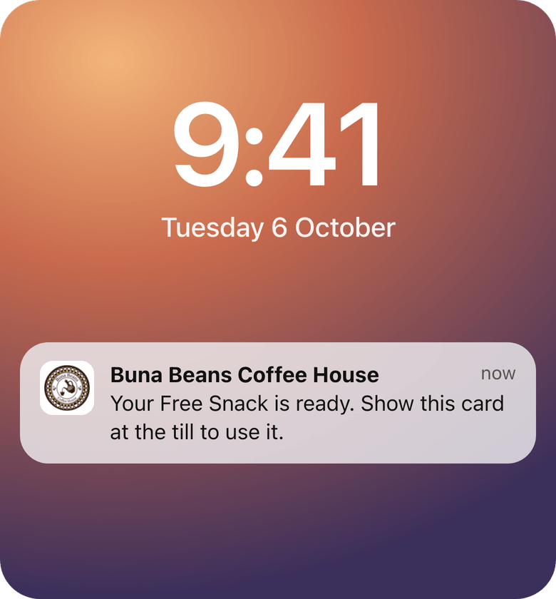 Example iPhone lock screen message from the same card: Your Free Snack is ready. Show this card at the till to use it.